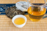 HelloYoung 100g Pu'er Raw Tea Iceland Yunnan Ancient Tea Spring Tea Cake Orchid Fragrance