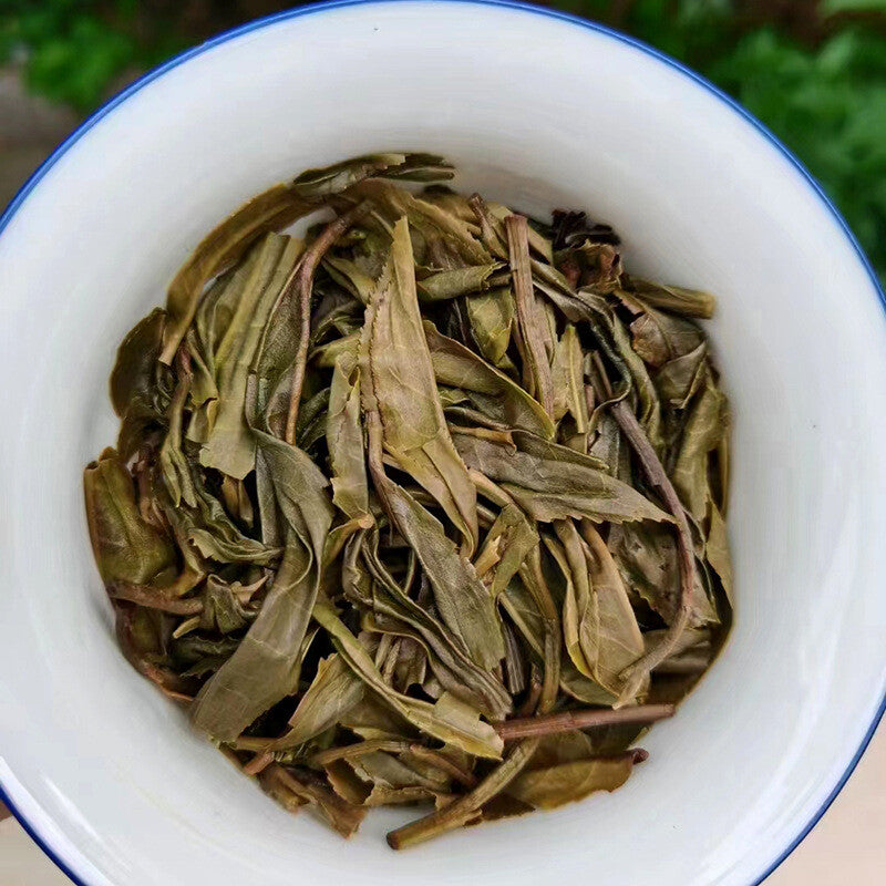 100g Yunnan Seven Tea CakesThousand Mountains Drunken Puerh Raw Tea Main image
