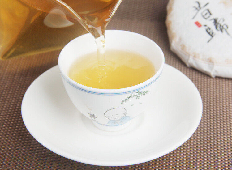HelloYoung 100g/cake Yunnan Pu'er raw tea cake Xigui wilderness tea Icelandic tea
