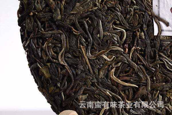 HelloYoung 357g Yunnan Pu'er Tea Da Xueshan Early Spring Ancient Raw Tea Seven Seed Cake