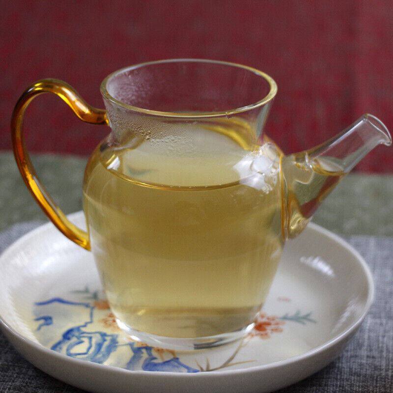HelloYoung 100g Yunnan Pu'er tea Icelandic raw peacock green cake seven cakes Mengku tea