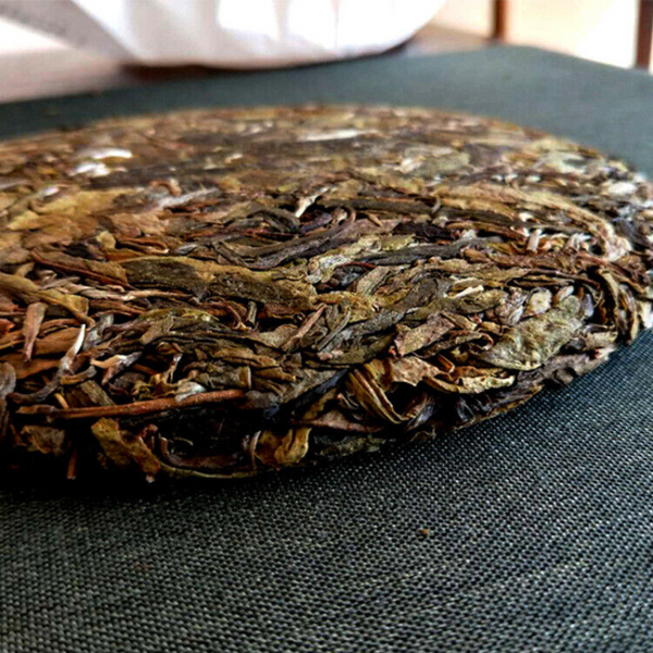 HelloYoung 357g Pu'er raw tea golden leaves golden Mengku yellow slices, seven seed cakes
