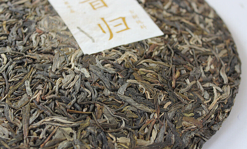 Xigui Raw Tea Yunnan Puerh Tea Seven Cakes 357g