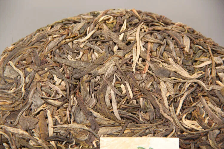 Yunnan Shen Puer Tea Cake Lao Ban Zhang Brand 357 Gram Raw Puerh Loss Weight