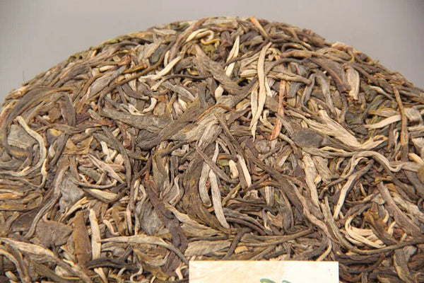 Yunnan Shen Puer Tea Cake Lao Ban Zhang Brand 357 Gram Raw Puerh Loss Weight