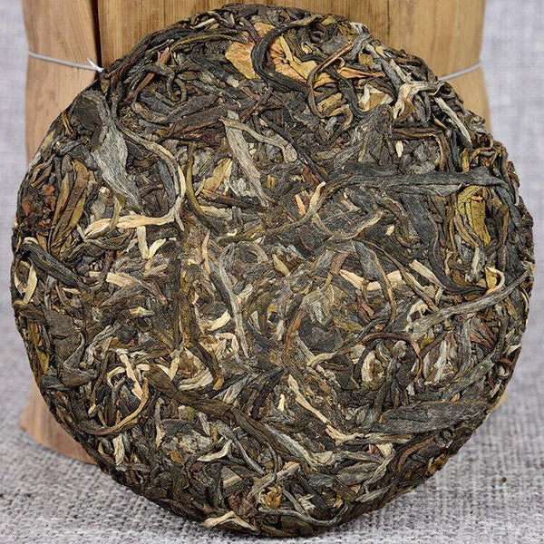 2012 Ice Island Ancient Tree Raw Cake Early Spring Yunnan Pu-erh Tea 100g