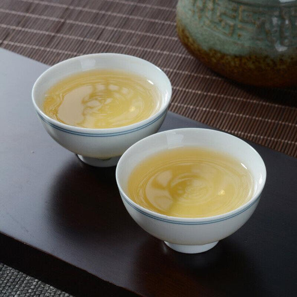 100g - Xi Gui Large Tree Raw Tea with Orchid Aroma  Yunnan Pu-erh Tea Cake