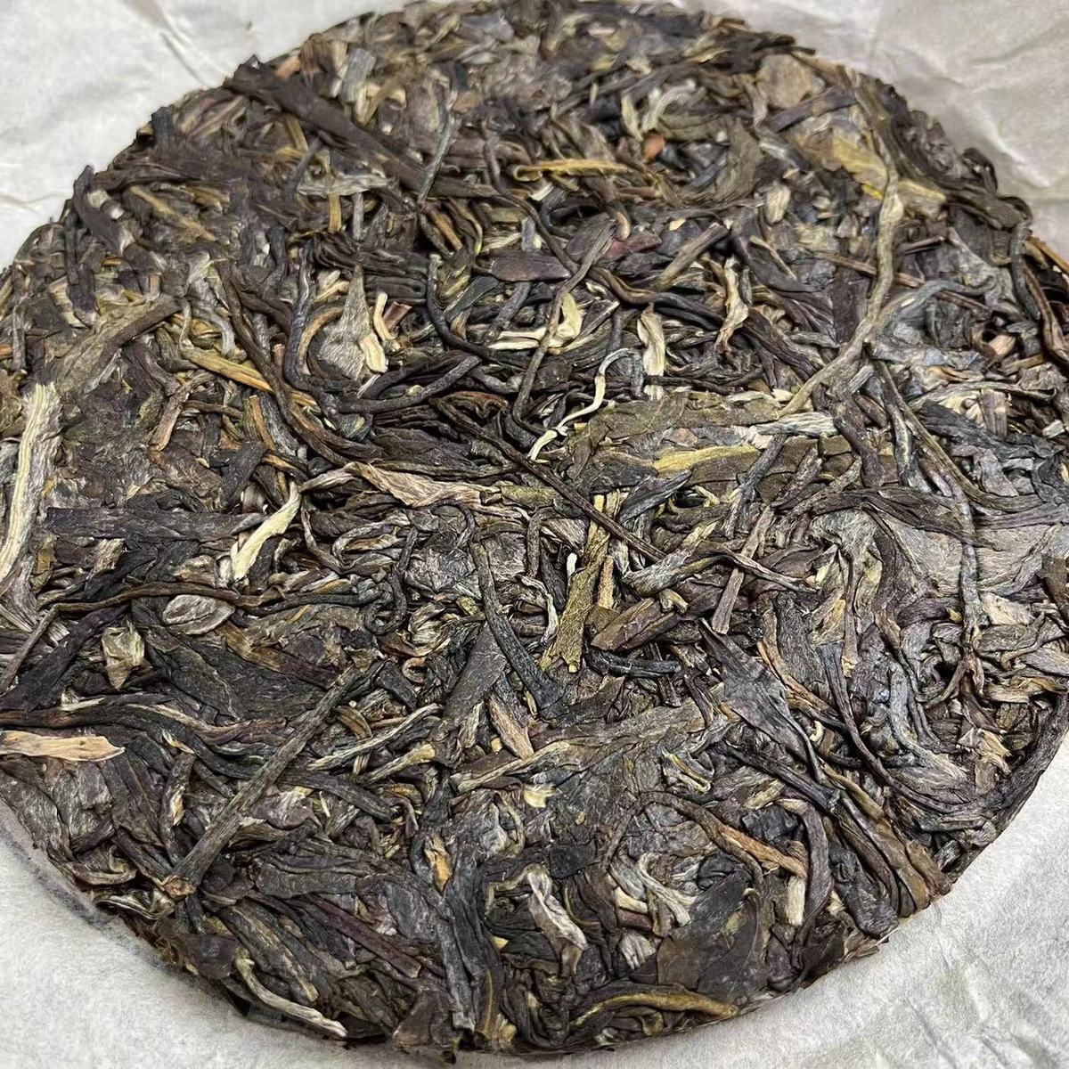 Rhinoceros Pond Head Spring Old Tree Puerh Raw Tea Tight Tea 100g Tea Cake