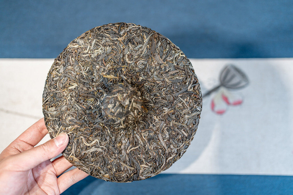 HelloYoung 357g DaXueshan Pu'er Raw Tea Yunnan First Spring Ancient Seven Seed Cake Tea