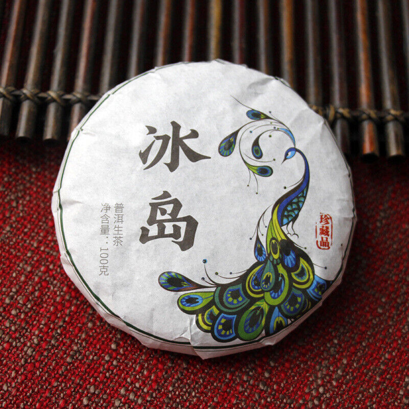 HelloYoung 100g Yunnan Pu'er tea Icelandic raw peacock green cake seven cakes Mengku tea