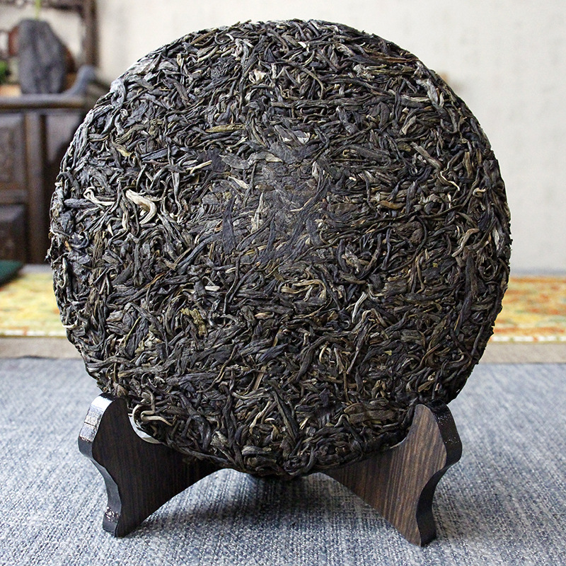 357g de thé Pu'er au début du printemps sept gâteaux islandais thé cru Pu'er