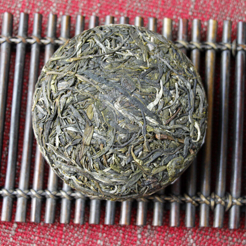 HelloYoung 100g Yunnan Pu'er tea Icelandic raw peacock green cake seven cakes Mengku tea