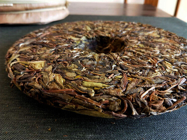 HelloYoung 357g Pu'er raw tea golden leaves golden Mengku yellow slices, seven seed cakes