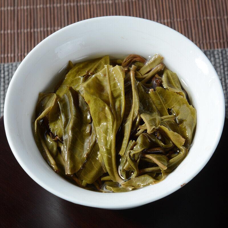 100g - Xi Gui Raw Tea with Orchid Aroma Yunnan Pu-erh Tea Cake