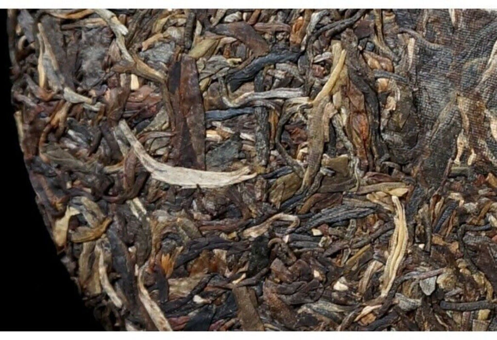 Yunnan Menghai Yiwu Ancient Tree Raw Pu-erh Tea 357g Brown Mountain Tea King
