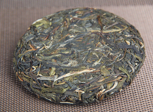 HelloYoung 100g/cake Yunnan Pu'er raw tea cake Xigui wilderness tea Icelandic tea