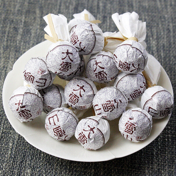 500g Yunnan Lincang Daxueshan Pu'er tea ripe tea ancient dragon pearl tea ripe
