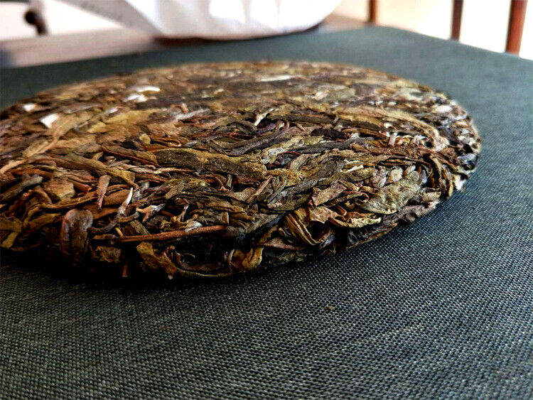 HelloYoung 357g Pu'er raw tea golden leaves golden Mengku yellow slices, seven seed cakes