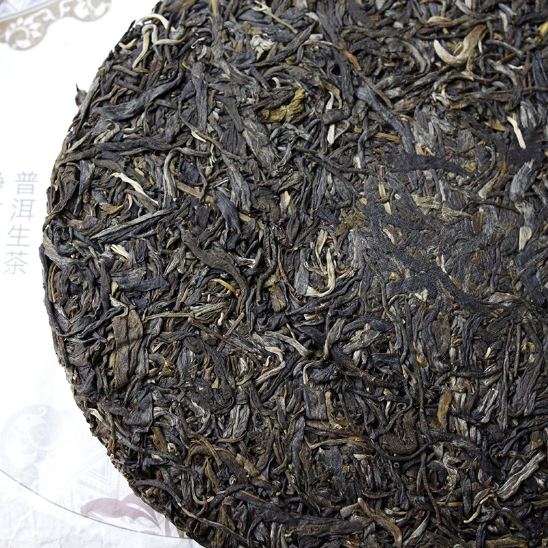 357g de thé Pu'er au début du printemps sept gâteaux islandais thé cru Pu'er