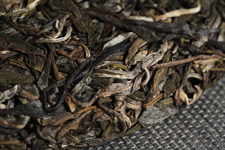 Xigui Desert Mountain Tea Cake Spring Tea 357g Seven Cakes Tea Yunnan Pu'er Tea