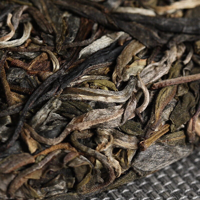 Xigui Desert Mountain Tea Cake Spring Tea 357g Seven Cakes Tea Yunnan Pu'er Tea