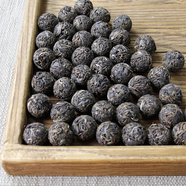 HelloYoung 500g Yunnan Lincang Daxueshan Pu'er tea ripe tea ancient dragon pearl tea ripe