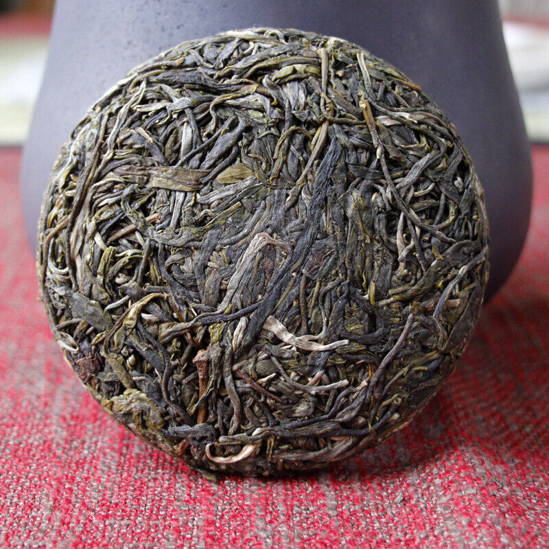 HelloYoung 100g Yunnan Pu'er tea Icelandic raw peacock green cake seven cakes Mengku tea