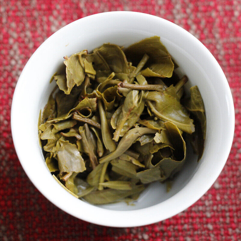 HelloYoung 100g Yunnan Pu'er tea Icelandic raw peacock green cake seven cakes Mengku tea