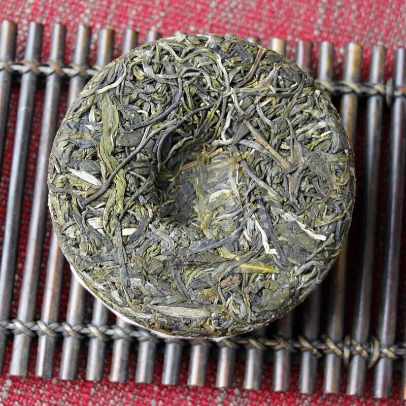 HelloYoung 100g Yunnan Pu'er tea Icelandic raw peacock green cake seven cakes Mengku tea
