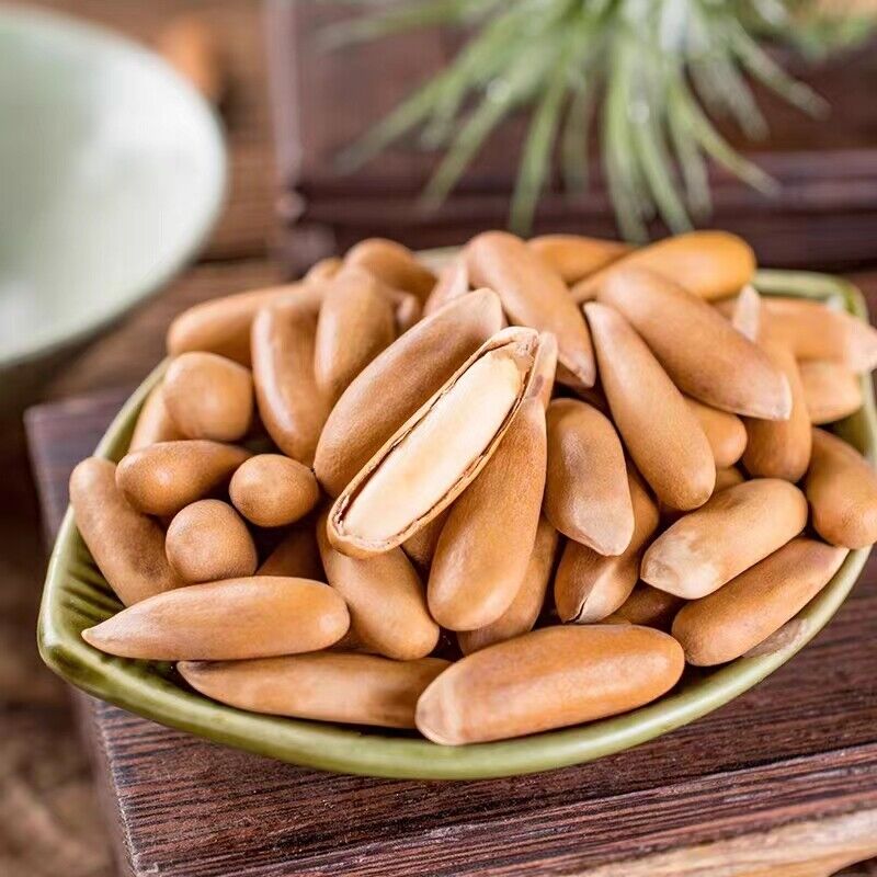 Hand-peeled pine nuts New Brazilian pine nuts Long grain large granular snack