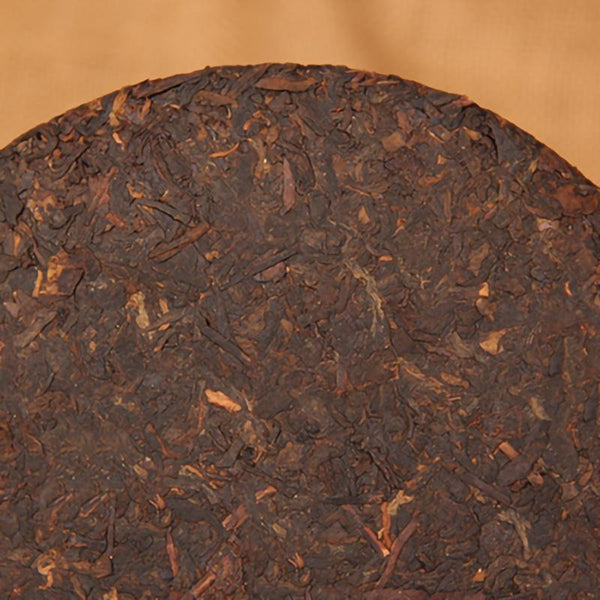 357g Certified Organic Yunnan Seven Tea Cake, Eight-Year-Old Pu'er Ripe Tea