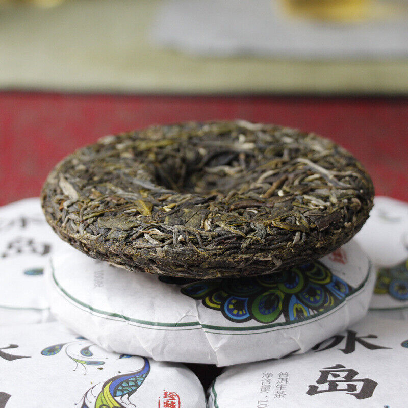 HelloYoung 100g Yunnan Pu'er tea Icelandic raw peacock green cake seven cakes Mengku tea
