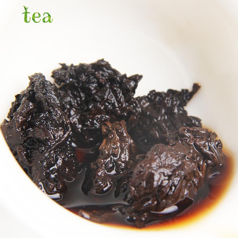 Yunnan Pu'er Tea 8 Year Aged Natural Tuocha Mengku Golden Bud Old Tree Loose Leaf Medium Size 云南普洱茶 8年陈天然沱茶 勐库金芽老树散茶 中号