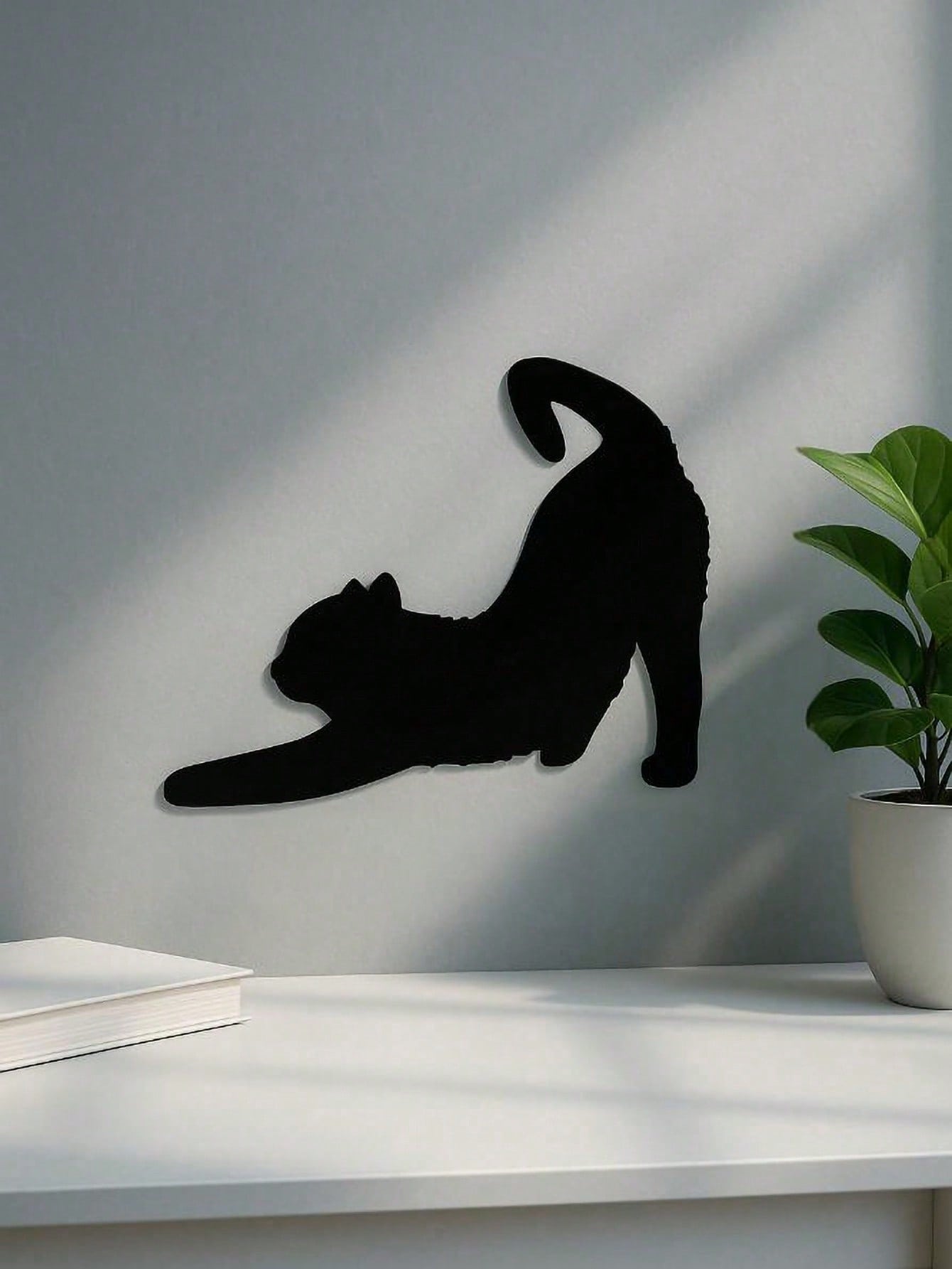 1 Pc Enchanting Metal Wall Panel of Stretching Cat | Exquisite Cat Silhouette Wall Decoration Sticker. This graceful iron art silhouette showcases a fascinating hanging wall art. It adds a touch of charm and playfulness, creating a captivating atmosphere