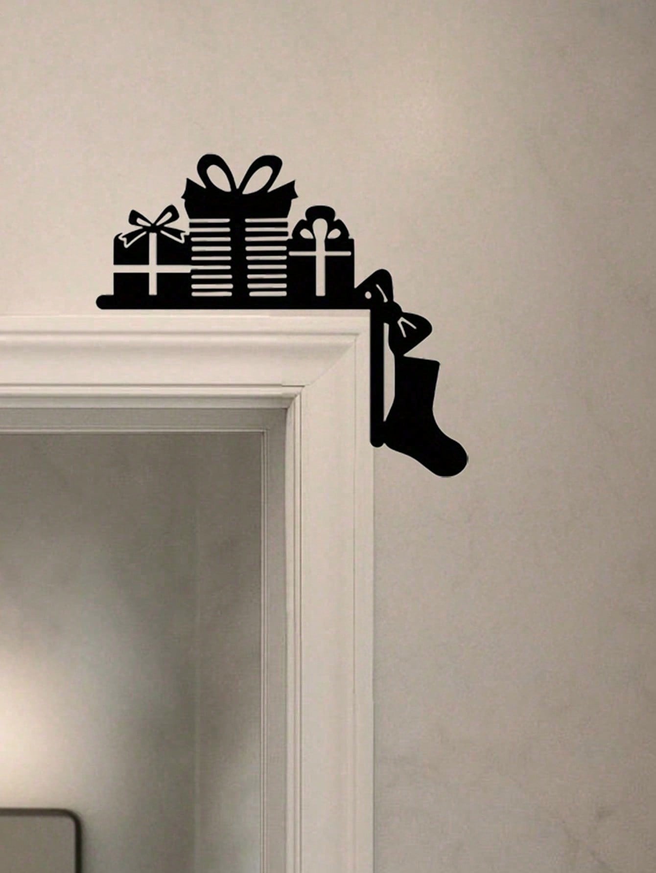 Elevate your holiday décor with this sleek, reusable metal ornament. Featuring minimalist festive silhouettes, it adds a touch of artistic warmth to any space. Easily hangs on doors, windows, or walls for versatile styling. Crafted from durable metal for Main image