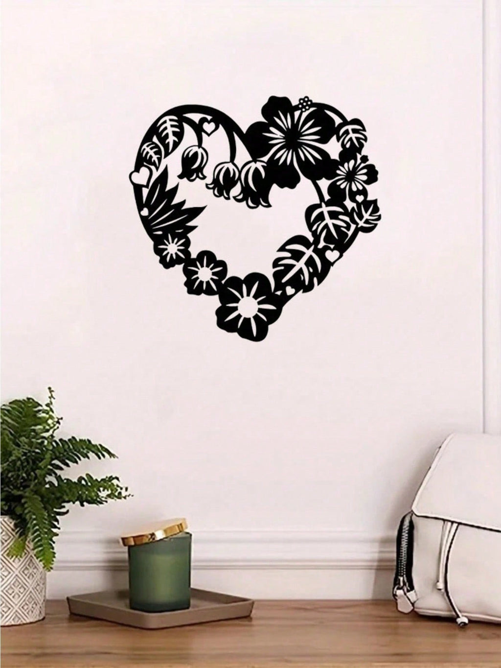A heart-shaped wrought iron holiday wall decoration with black metal flowers and stamens intertwined, which can be used as a Valentine's Day gift, and romantic people deserve it! Birthday graduation gift.