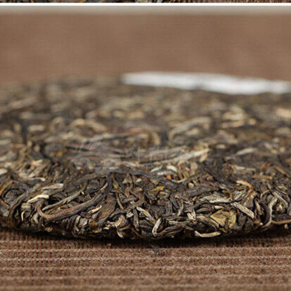 2016 Xiaguan Qian Jia Zhai Wild Aged Old Tree Round Cake Puer Raw Pu'er Tea 357g