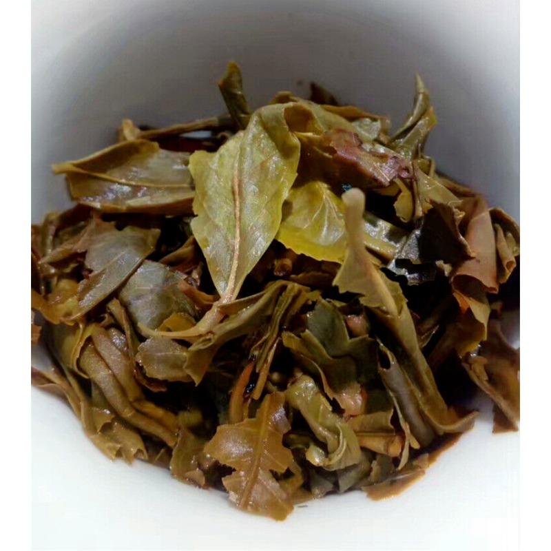 357g Pu'er raw tea golden leaves golden Mengku yellow slices, seven seed cakes