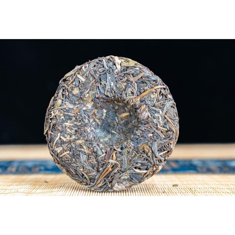 100g Pu'er Raw Tea Iceland Yunnan Ancient Tea Spring Tea Cake Orchid Fragrance