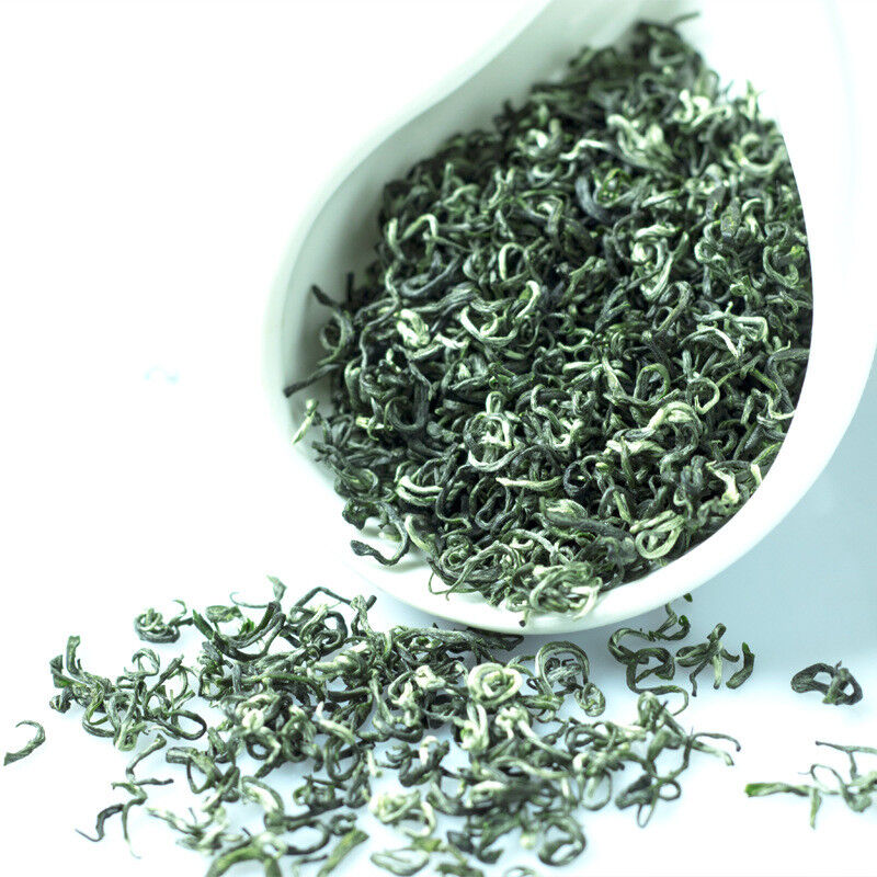 Close-up view of high-quality Biluochun green tea loose leaves showing fresh spring harvested tea leaves and natural texture Main image