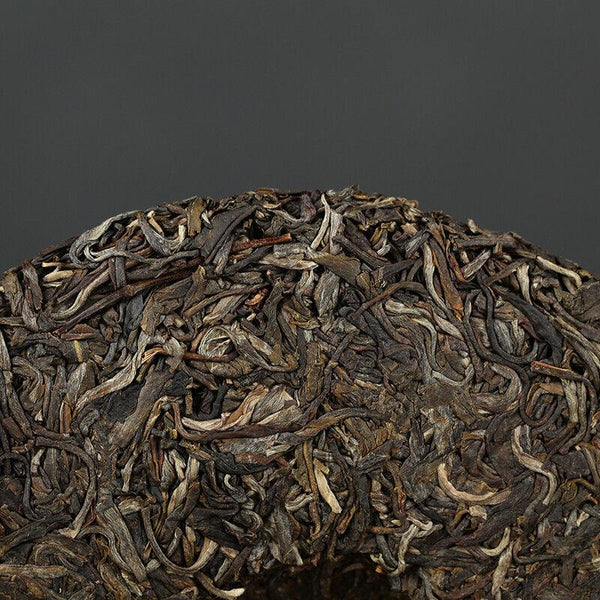 2016 Xiaguan Qian Jia Zhai Wild Aged Old Tree Round Cake Puer Raw Pu'er Tea 357g
