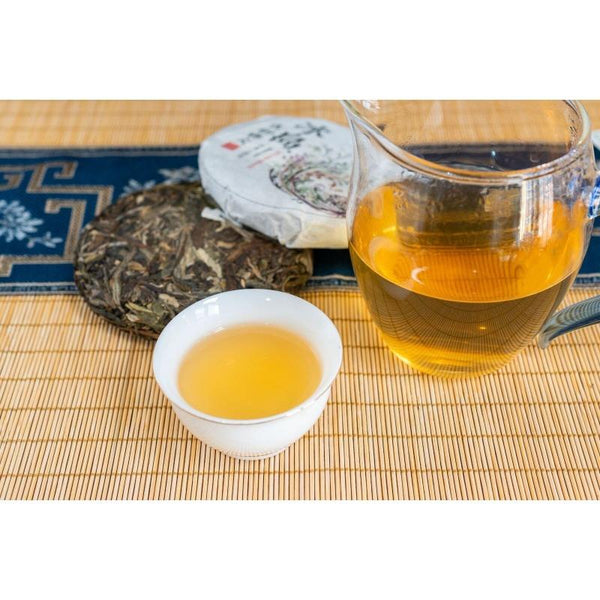 HelloYoungTea 100g Pu'er Raw Tea Iceland Yunnan Ancient Tea Spring Tea Cake Orchid Fragrance