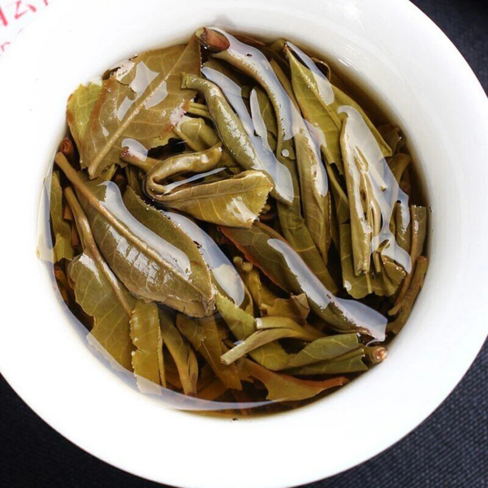 HelloYoung Haiwan Old Comrade 7548 Pu-erh Strong-flavor 181 Raw Puer Tea Cake 357g