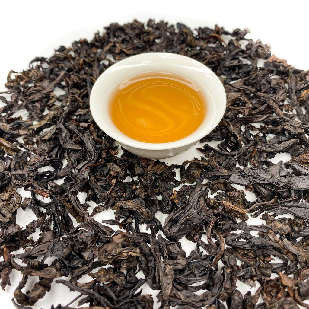 Da Hong Pao Wuyi rock tea leaves with twisted oolong texture and natural tea ingredients for daily wellness
