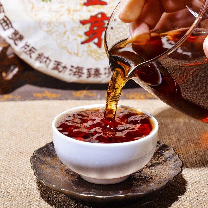 HelloYoungTea 2010 Ban Zhang Golden Bud Menghai Ancient Tree Shu Pu-erh Tea Cake 357g