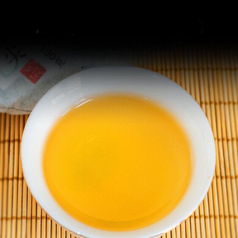 HelloYoungTea 100g Pu'er Raw Tea Iceland Yunnan Ancient Tea Spring Tea Cake Orchid Fragrance