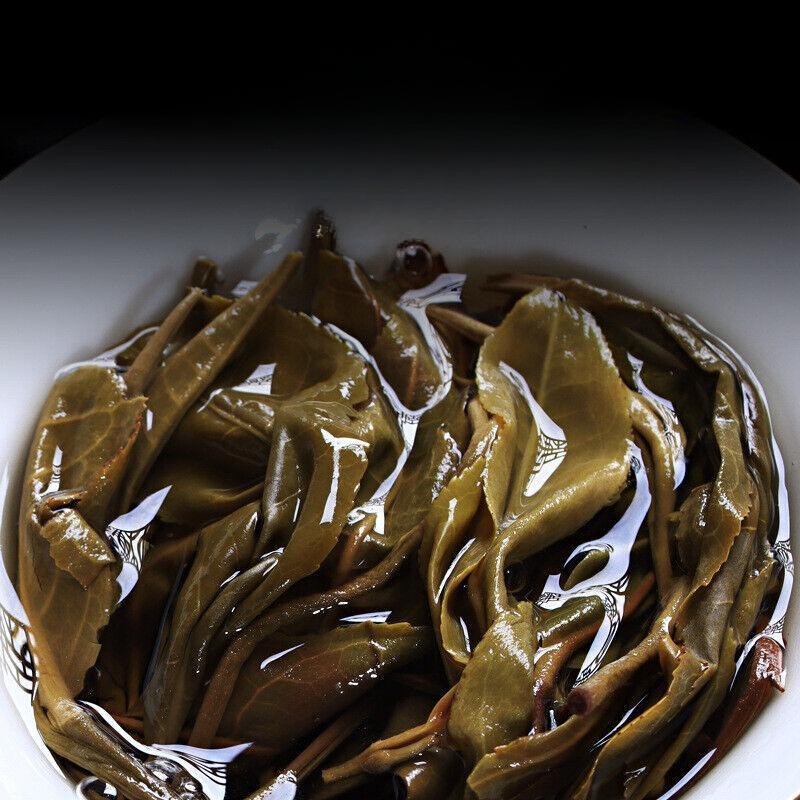 100g Pu'er Raw Tea Iceland Yunnan Ancient Tea Spring Tea Cake Orchid Fragrance