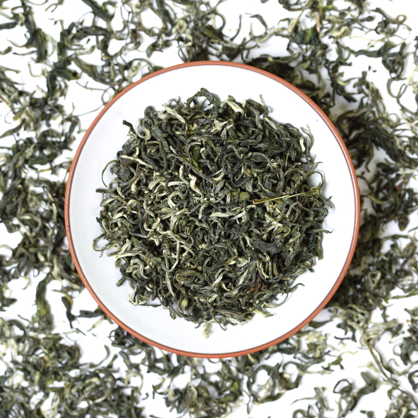 Close-up of HelloYoung Tea Biluochun green tea packaging showing premium loose leaf Chinese green tea details