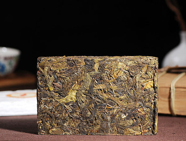 HelloYoung Pu Zi Wei Mengku Ba Nuo Old Leaves Old Tree Huang Pian Pu Er Raw Tea Brick 500g