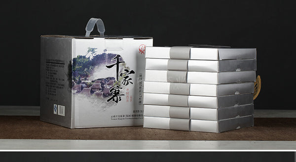 Xiaguan Qian Jia Zhai Wild Aged Old Tree Round Cake Puer Raw Pu'er Tea 357g